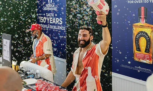 Herradura bartender serving drinks amid bubbles