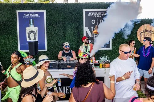 DJ playing to a dancing crowd at the Jack Daniel's bar